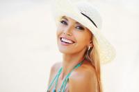 Smiling woman with hat